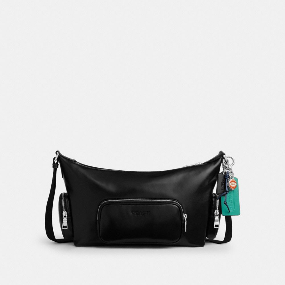 COACH®,Finn Crossbody Bag With Pockets And Charms,,Front View