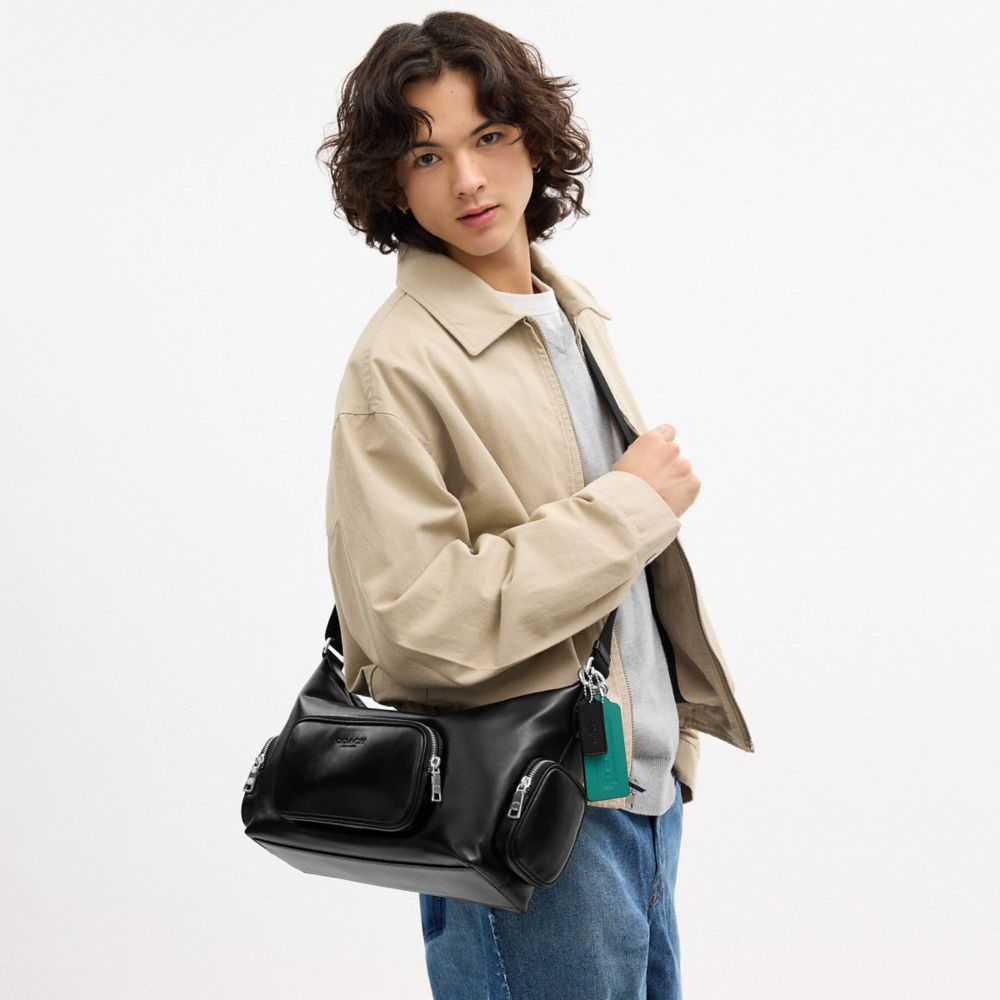 COACH®,Finn Crossbody Bag With Pockets And Charms,,Detail View