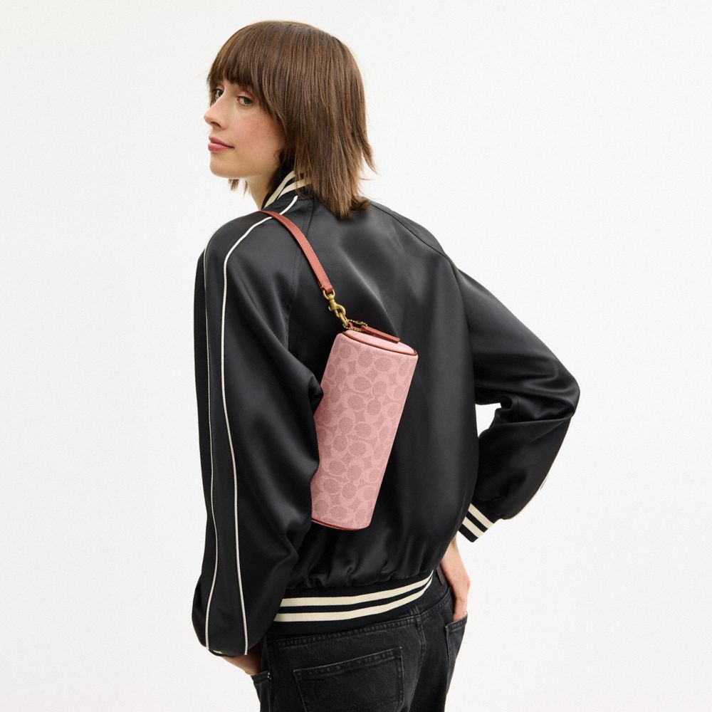 COACH®,Barrel Bag In Signature Canvas,Leather,Canvas,Lining Canvas,Cotton,Barrel Bag,Pendant,Piping,Logo,Adjustable,Brass,...,Pink,Detail View