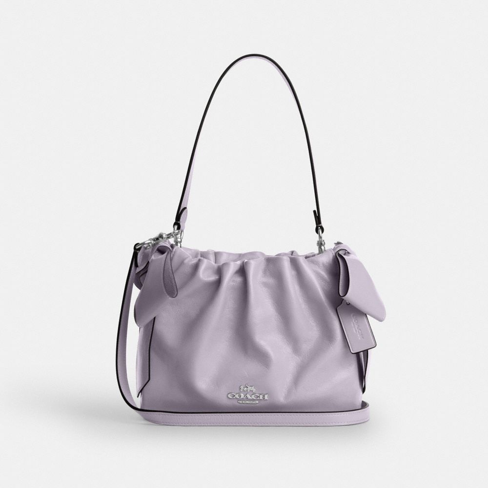 COACH®,フェイ ドローストリング バッグ・ボウ,斜め掛け&ボディバッグ,ｼﾙﾊﾞｰ/ﾗｲﾄ ｱﾒｼｽﾄ