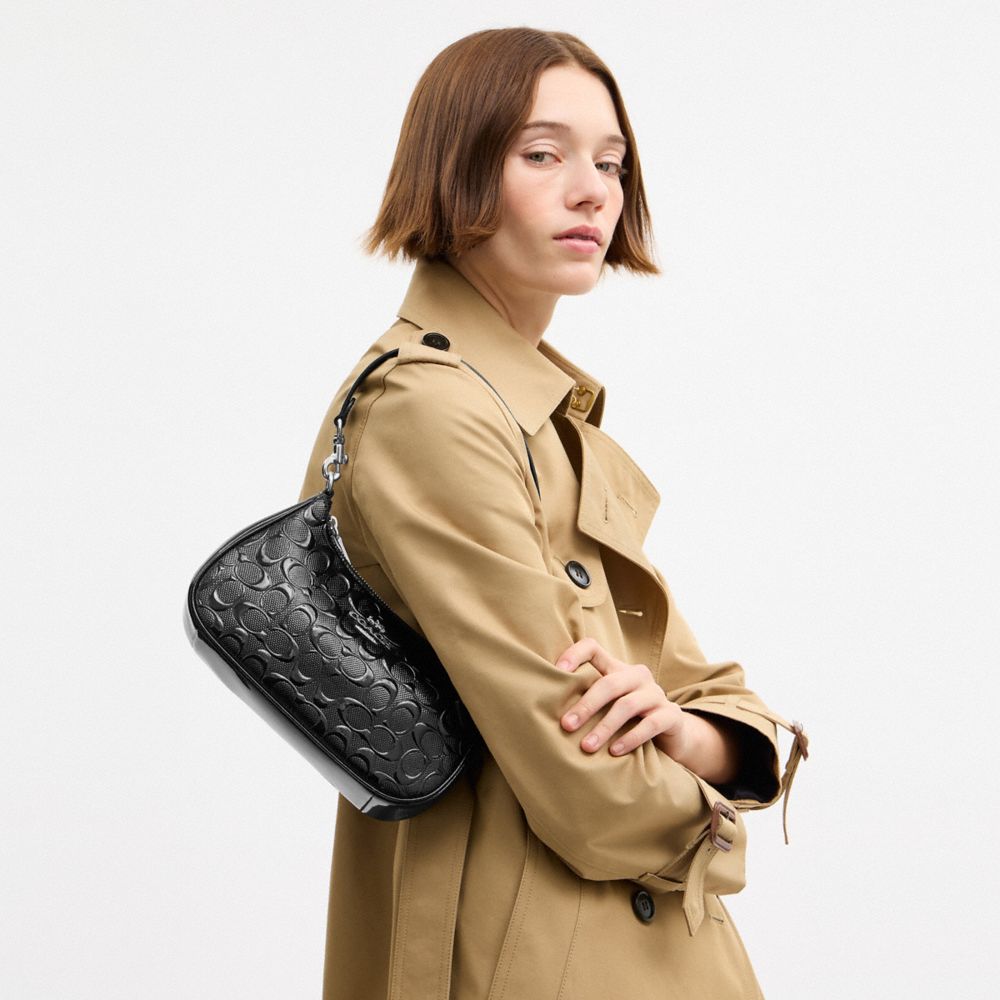 COACH®,Teri Shoulder Bag In Signature Leather With Heart Charm,Black