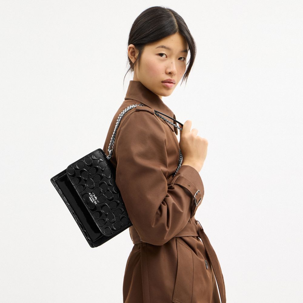 COACH®,Klare Crossbody Bag In Signature Leather,Leather,Crossbody,Metal,Logo,Silver Metal,Day Party,Black,Detail View