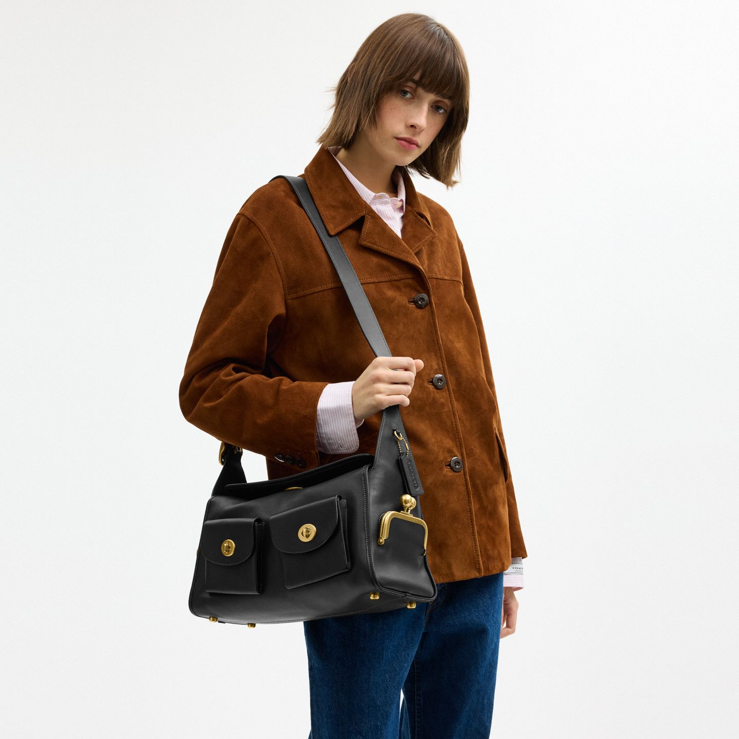 Женская сумка Coach Turnlock Haversack, цвет: Латунный / Чёрный — фото 7