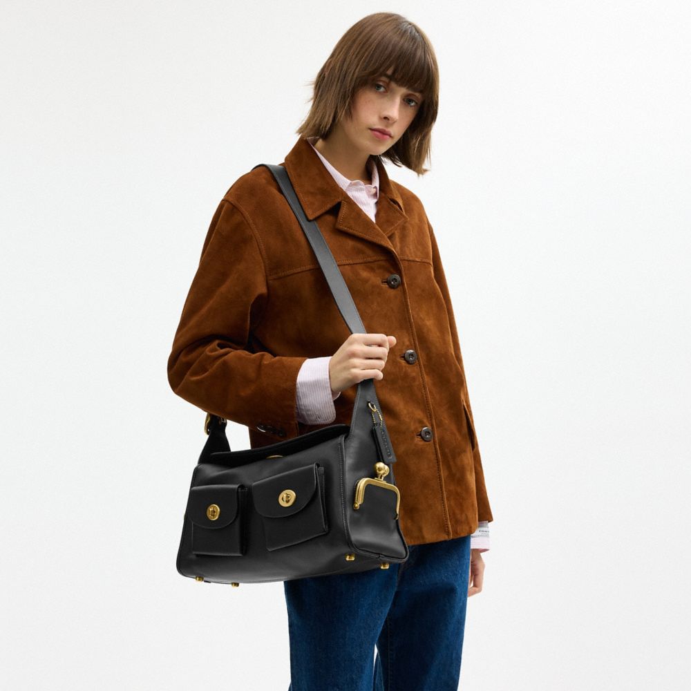 Женские сумки Coach Turnlock Haversack Bag — фото 7