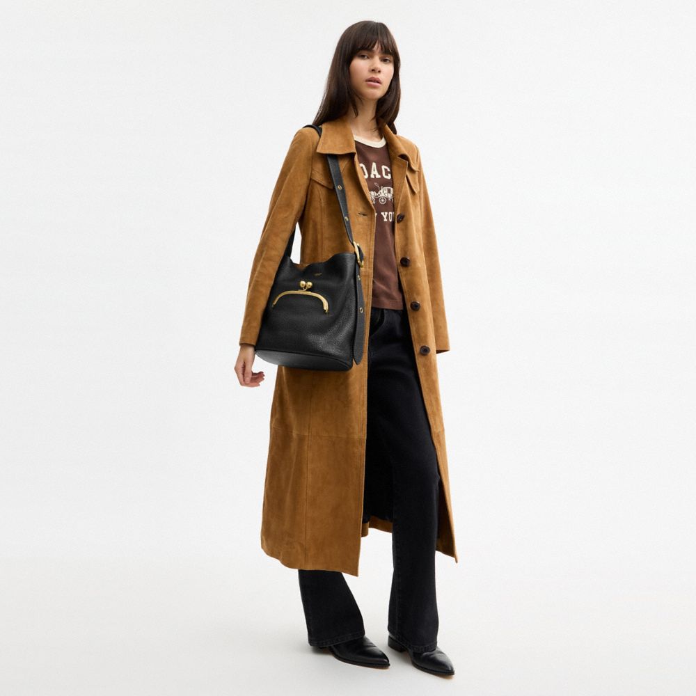 COACH®,Bleecker Bucket Bag With Kisslock,Leather,Bucket,Pendant,Adjustable,Brass,Day Party,Black,Detail View