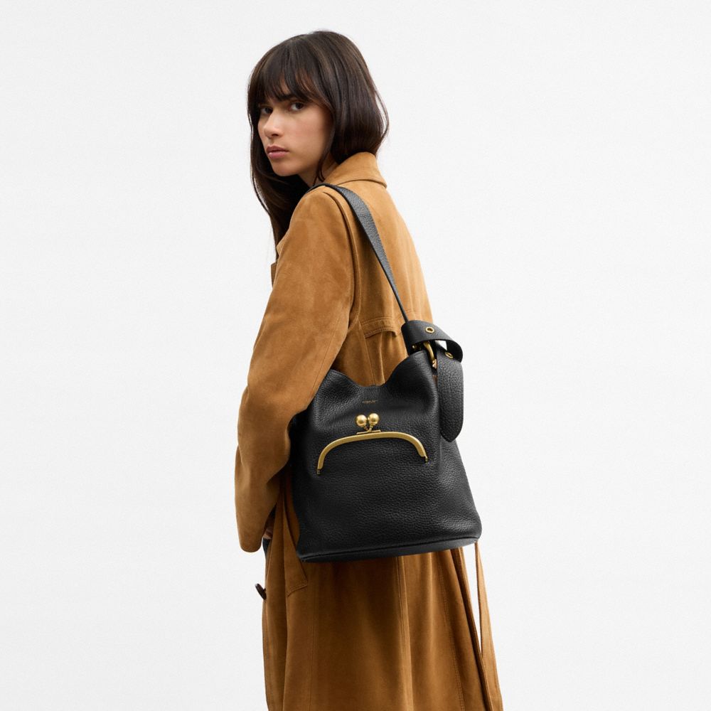 COACH®,Bleecker Bucket Bag With Kisslock,Leather,Bucket,Pendant,Adjustable,Brass,Day Party,Black,Detail View