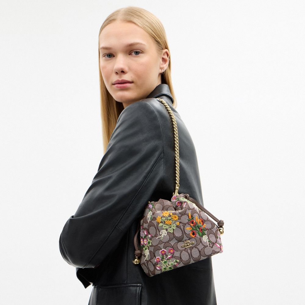 COACH®,Faye Mini Drawstring Bag In Signature Jacquard With Floral Embroidery,,Detail View