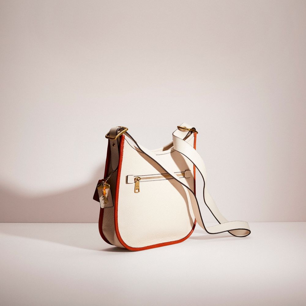 Emery crossbody discount with varsity stripe