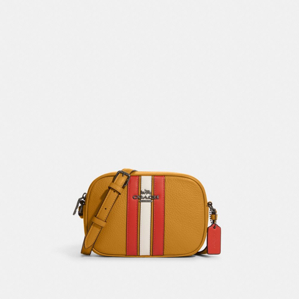 COACH®  Mini Jamie Camera Bag In Signature Canvas With Varsity Motif