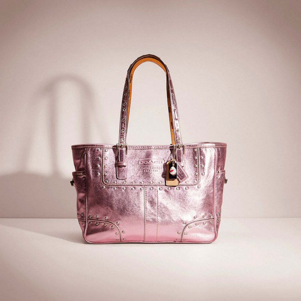 Pink metallic hot sale coach purse