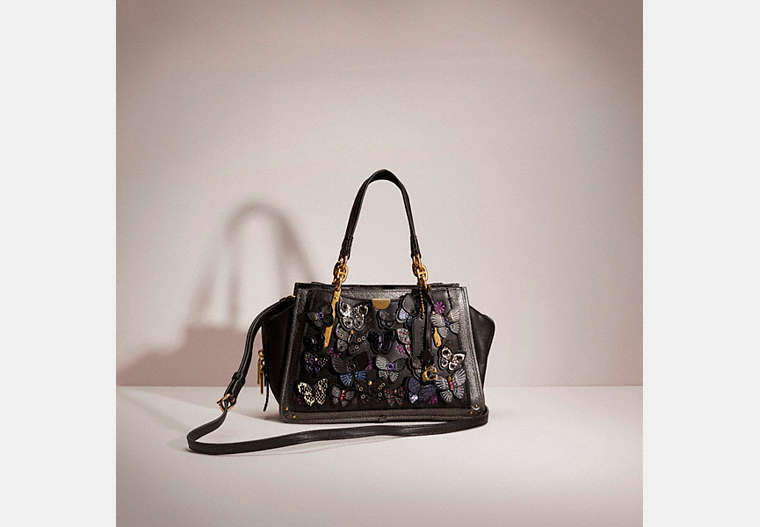 COACH®,RESTORED DREAMER WITH BUTTERFLY APPLIQUE AND SNAKESKIN DETAIL,Smooth Leather,Small,Brass/Black Multi,Front View