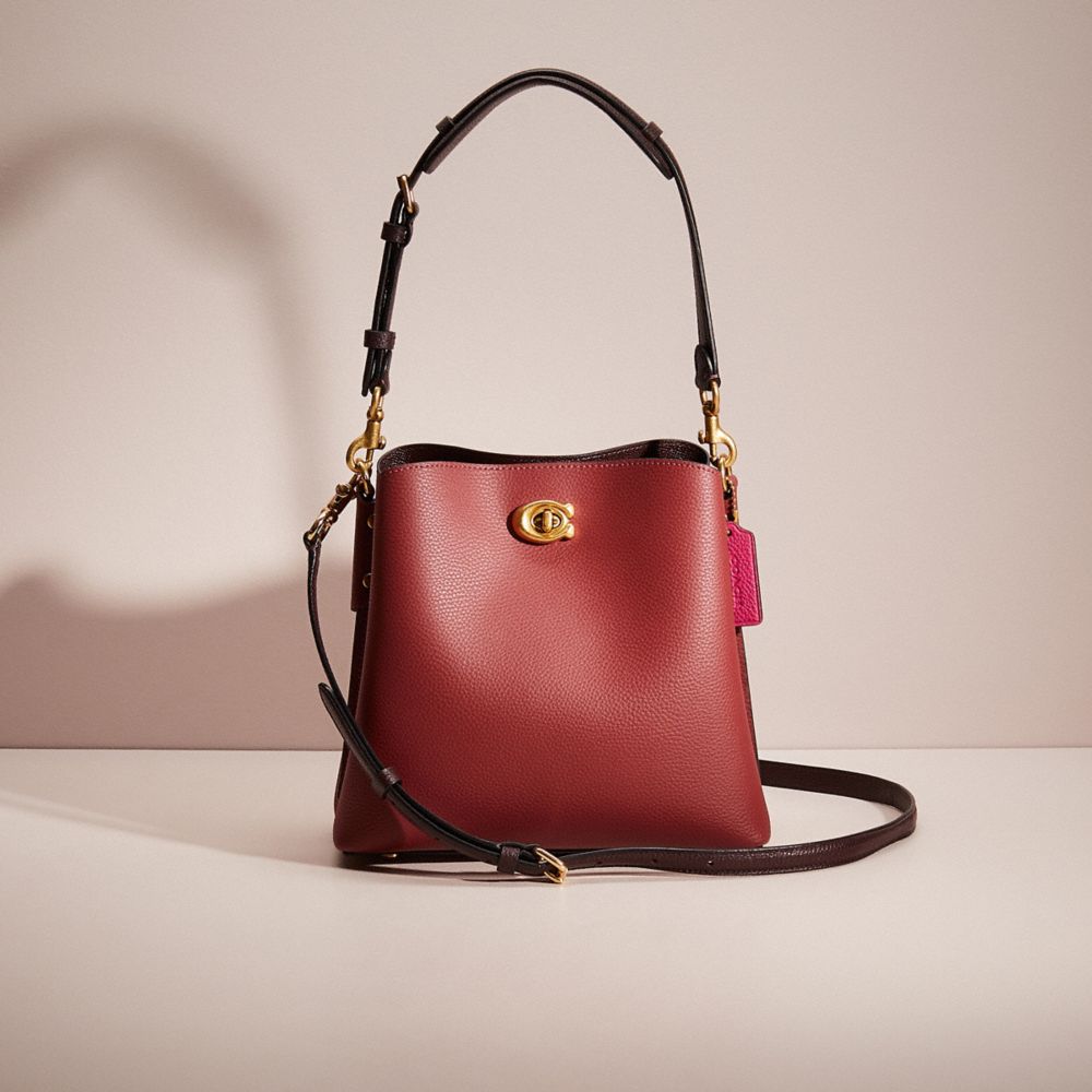 COACH®,RESTORED WILLOW BUCKET BAG IN COLORBLOCK,Polished Pebble Leather,Medium,Brass/Cherry,Front View