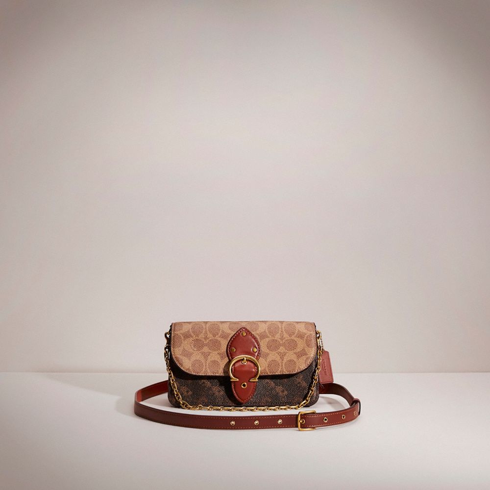 COACH®,RESTORED BEAT CROSSBODY CLUTCH IN SIGNATURE CANVAS WITH HORSE AND CARRIAGE PRINT,Mini,Brass/Tan Truffle Rust,Front View