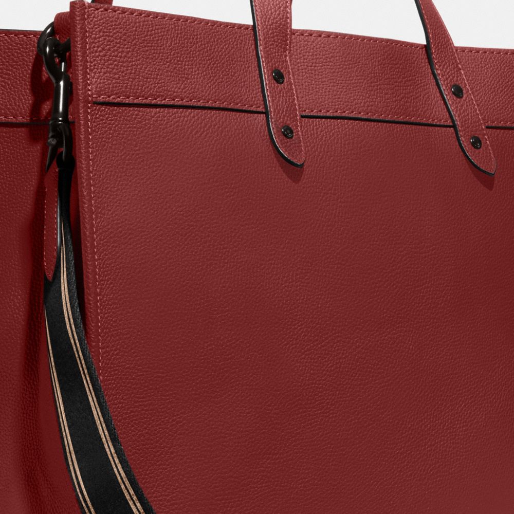 COACH®,FIELD TOTE BAG 40 WITH COACH BADGE,Polished Pebble Leather,X-Large,Ruby Red,Angle View