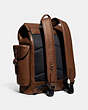 COACH®,HITCH BACKPACK,Leather,Dark Saddle,Angle View