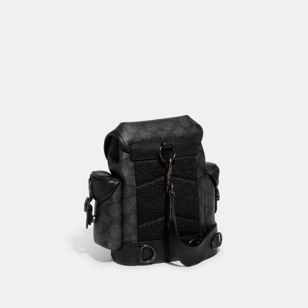 COACH®,HITCH BACKPACK 13 IN SIGNATURE CANVAS,Signature Coated Canvas,Mini,Charcoal,Angle View