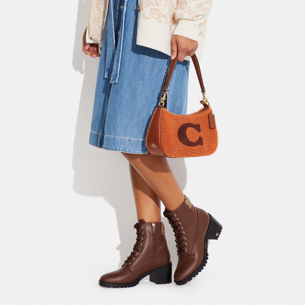 COACH®  Coach X Peanuts Teri Shoulder Bag In Signature Canvas With Patches