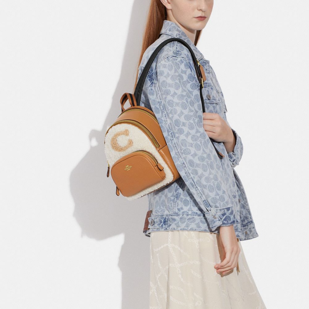 COACH® | Mini Court Backpack With Coach Motif