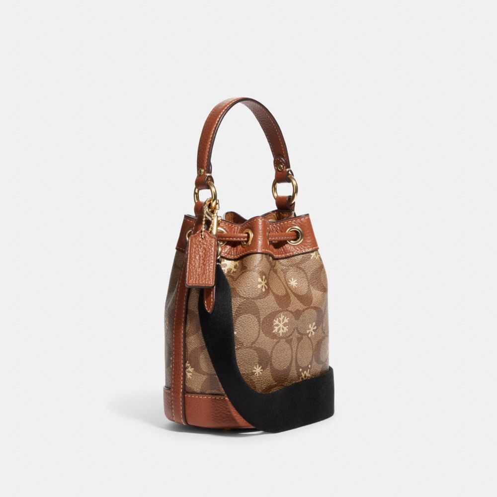 COACH®  Dempsey Drawstring Bucket Bag 15 In Signature Canvas With Star And  Snowflake Print