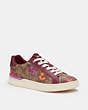 COACH®,CLIP LOW TOP SNEAKER IN SIGNATURE CANVAS WITH FLORAL PRINT,Signature Coated Canvas,Khaki/ Black Cherry,Front View