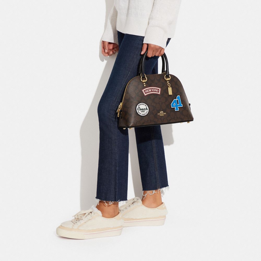 COACH®,Katy Satchel In Signature Canvas With Ski Patches,,Detail View