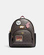 COACH®,COURT BACKPACK IN SIGNATURE CANVAS WITH SKI PATCHES,Large,Gold/Brown Black Multi,Front View