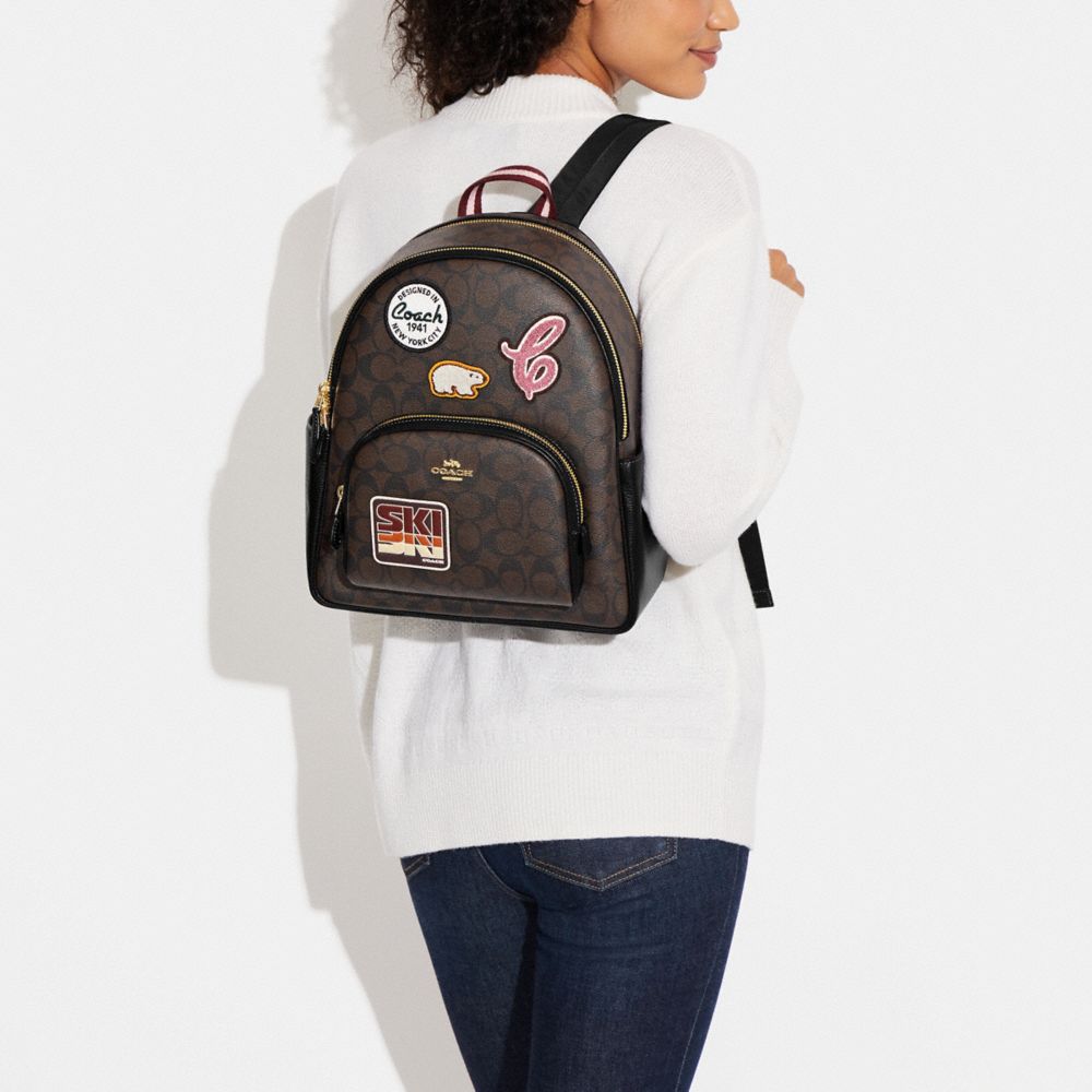 COACH® | Court Backpack In Signature Canvas With Ski Patches