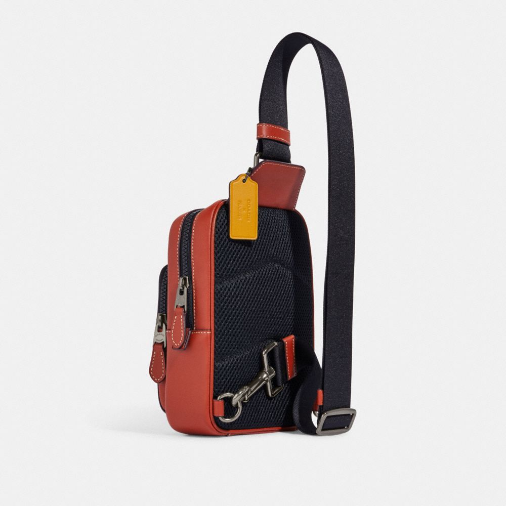 COACH®,Coach X Peanuts Track Pack 14 In Signature Canvas With Snoopy Woodstock Print,,Angle View