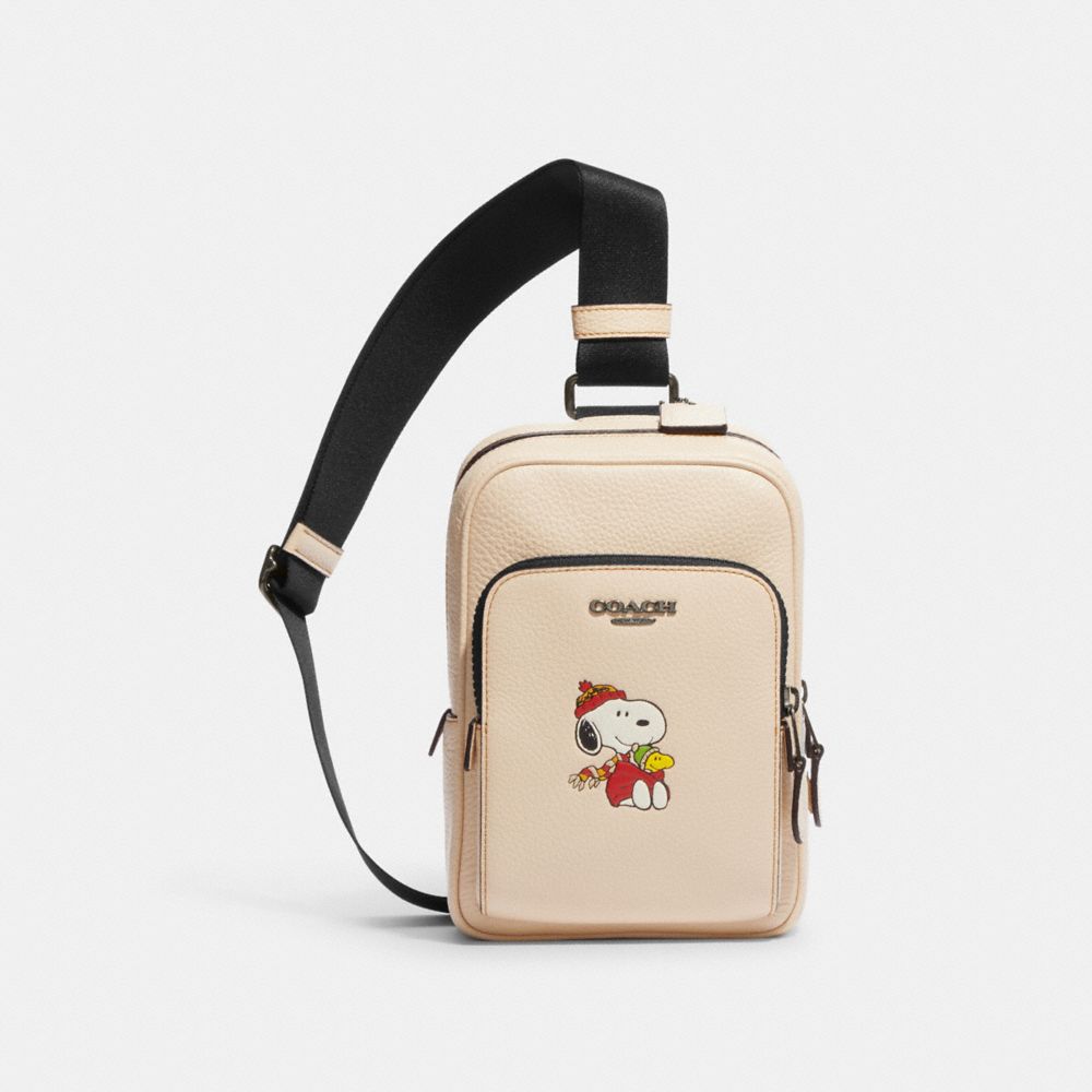 【COACH X PEANUTS トラックパック　新品☆ボディバッグ☆スヌーピースヌーピー柄カーキマルチ