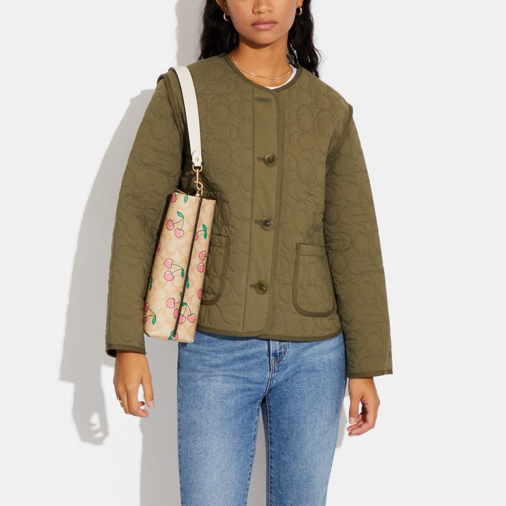 COACH®,Mollie Bucket Bag In Signature Canvas With Heart Cherry Print,,Detail View