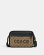 COACH®,GRAHAM CROSSBODY BAG IN SIGNATURE CANVAS WITH VARSITY MOTIF,Medium,Black Antique Nickel/Khaki/Amazon Green,Front View