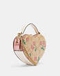 COACH®,HEART CROSSBODY IN SIGNATURE CANVAS WITH HEART CHERRY PRINT,Fabric,Gold/Light Khaki Multi,Angle View