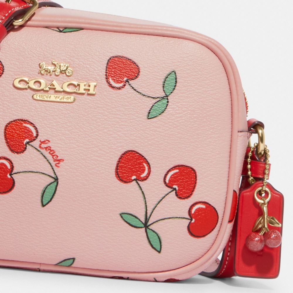 white / cream with pink cherry hearts coach purse