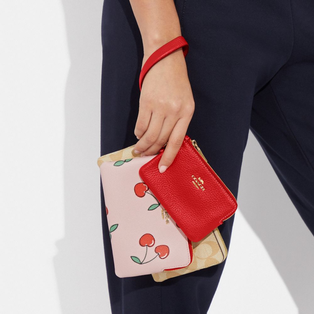 COACH®,CORNER ZIP TRIO IN SIGNATURE CANVAS AND HEART CHERRY PRINT,Mini,Im/Bright Poppy/Khaki Multi,Detail View