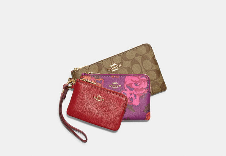 COACH®,CORNER ZIP WRISTLET TRIO WITH SIGNATURE CANVAS AND PEONY PRINT,Signature Coated Canvas,Mini,Gold/Red Apple Multi/Khaki,Front View