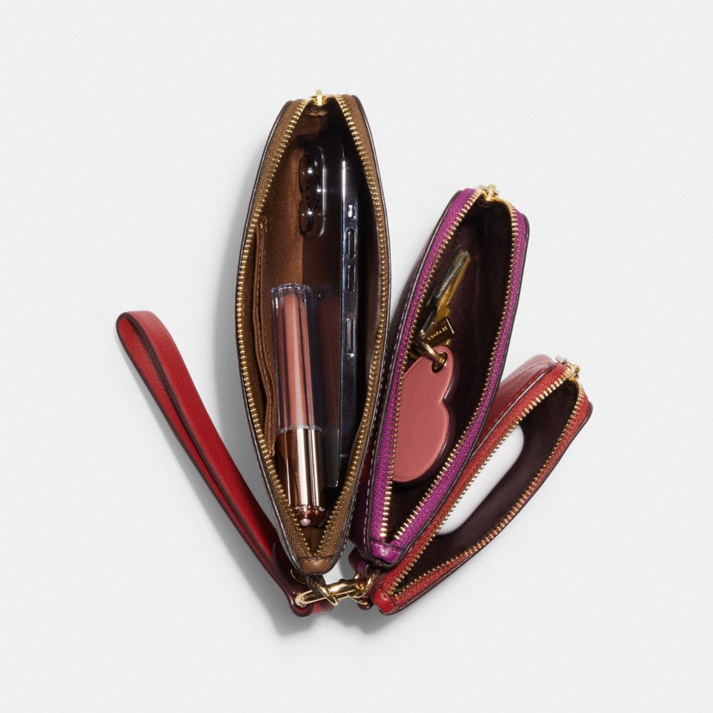 COACH®,Corner Zip Wristlet Trio With Signature Canvas And Peony Print,,Interior View