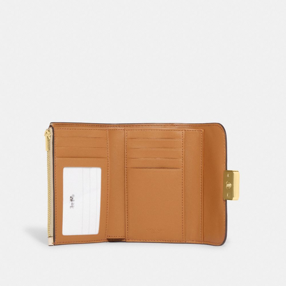 Coach ivory discount wallet