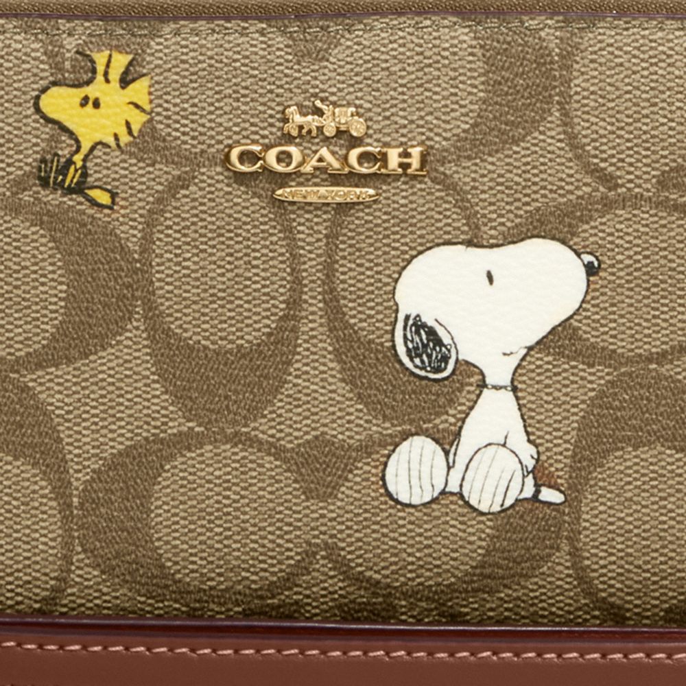 COACH® | Coach X Peanuts Long Zip Around Wallet In Signature