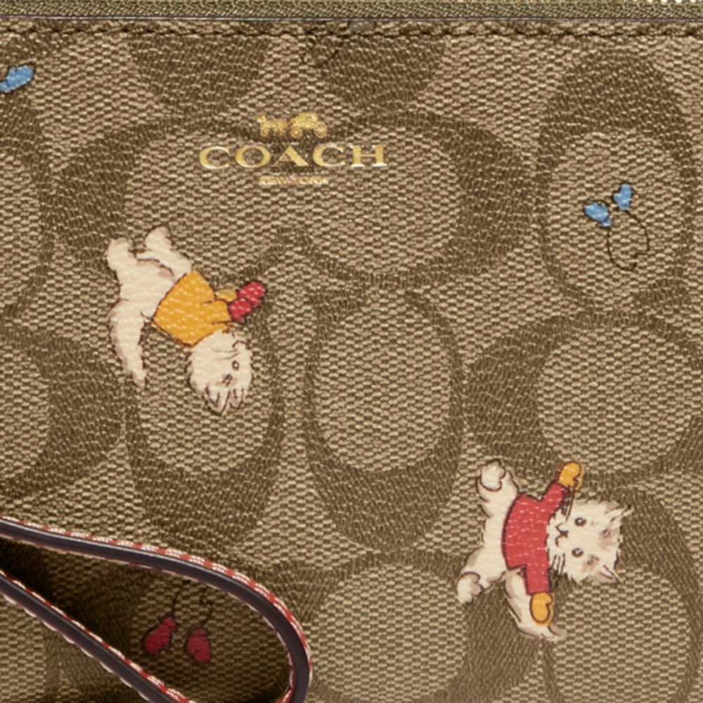 Corner Zip Wristlet In Signature Canvas With Cat Mittens Print