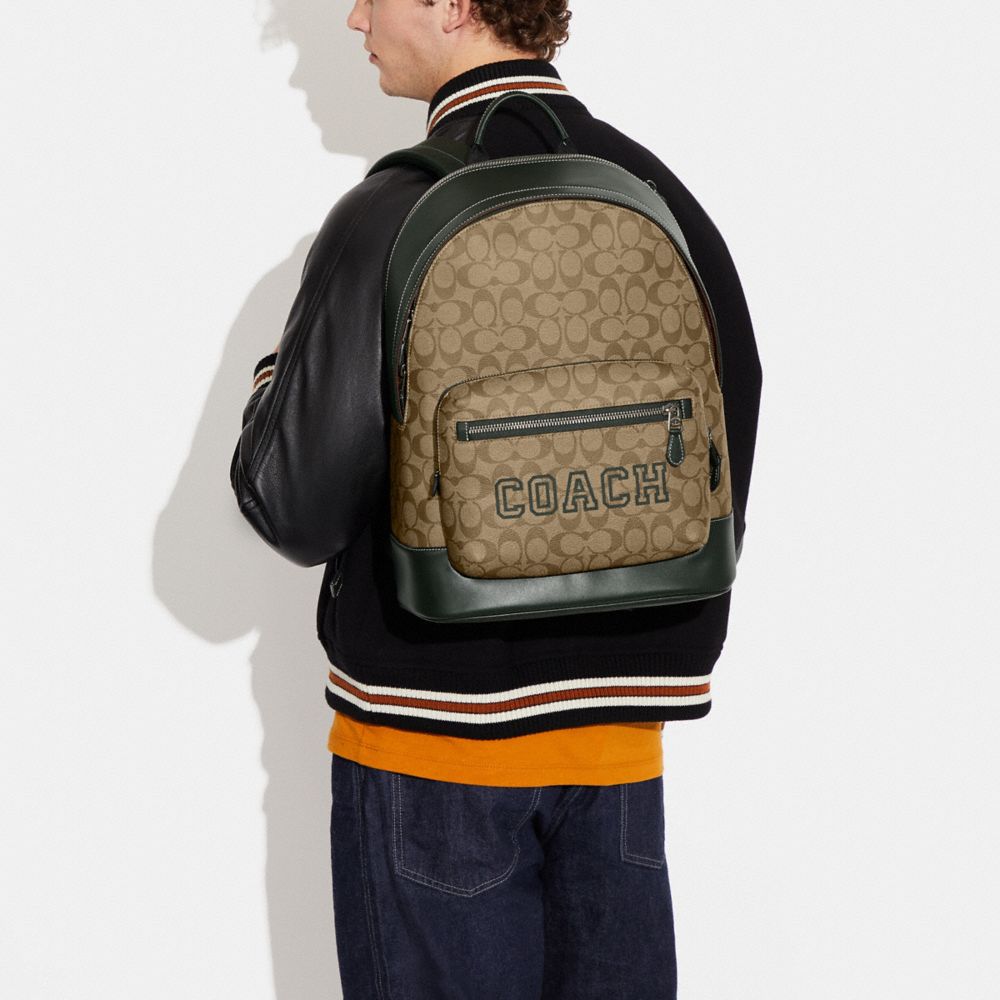 COACH®,West Backpack In Signature Canvas With Varsity Motif,,Detail View