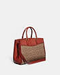 COACH®,BROOKE CARRYALL IN SIGNATURE CANVAS,Signature Coated Canvas,Large,Brass/Tan/Rust,Angle View