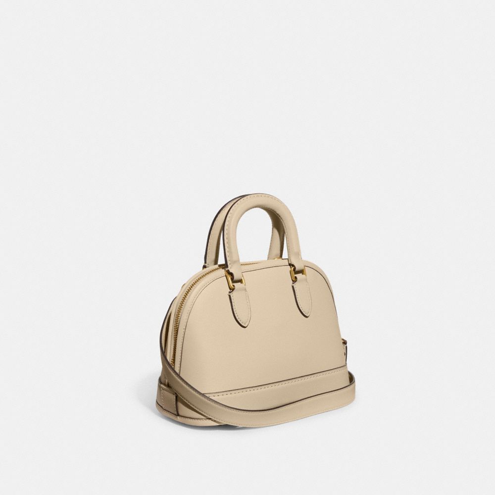 COACH®,REVEL BAG 24,Glovetan Leather,Medium,Brass/Ivory,Angle View
