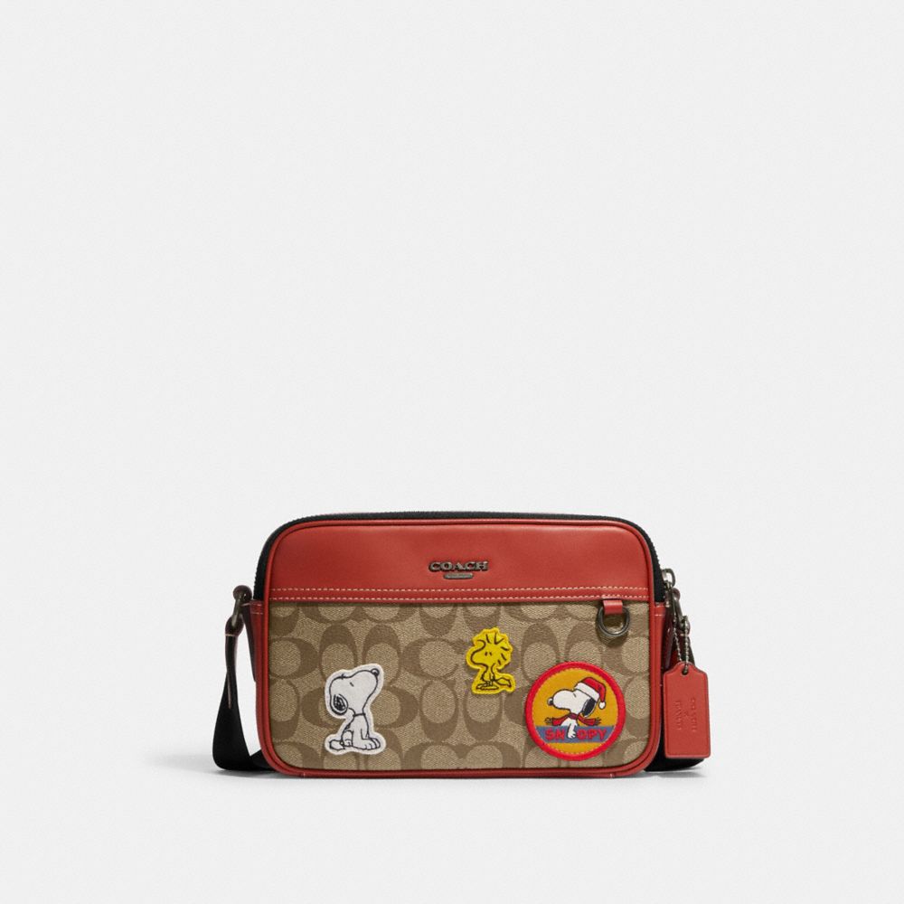 COACH®,COACH X PEANUTS GRAHAM CROSSBODY BAG IN SIGNATURE CANVAS WITH PATCHES,Medium,Gunmetal/Khaki Multi,Front View