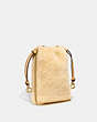 COACH®,DRAWSTRING POUCH IN SHEARLING,Shearling,Mini,Brass/Natural,Angle View