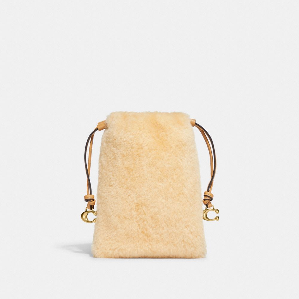 COACH®,POCHETTE À LIEN COULISSANT EN RASON,Laiton/Naturel,Back View