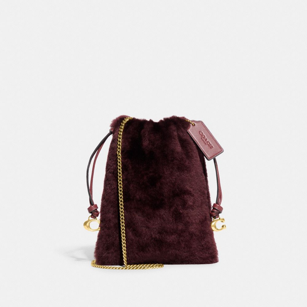 Coach on sale drawstring backpacks