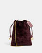 COACH®,DRAWSTRING POUCH IN SHEARLING,Shearling,Mini,Brass/Sangria,Front View
