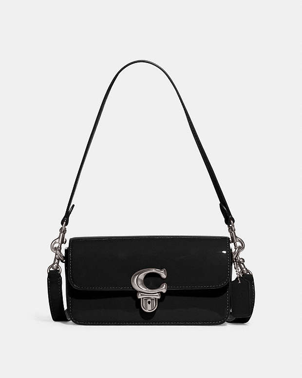 Coach Monogram-plaque Pebbled-leather Pouch Bag In B4/black