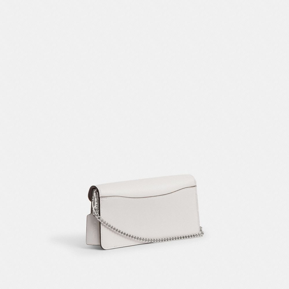 COACH®,Tabby Chain Clutch In Signature Canvas,,Angle View