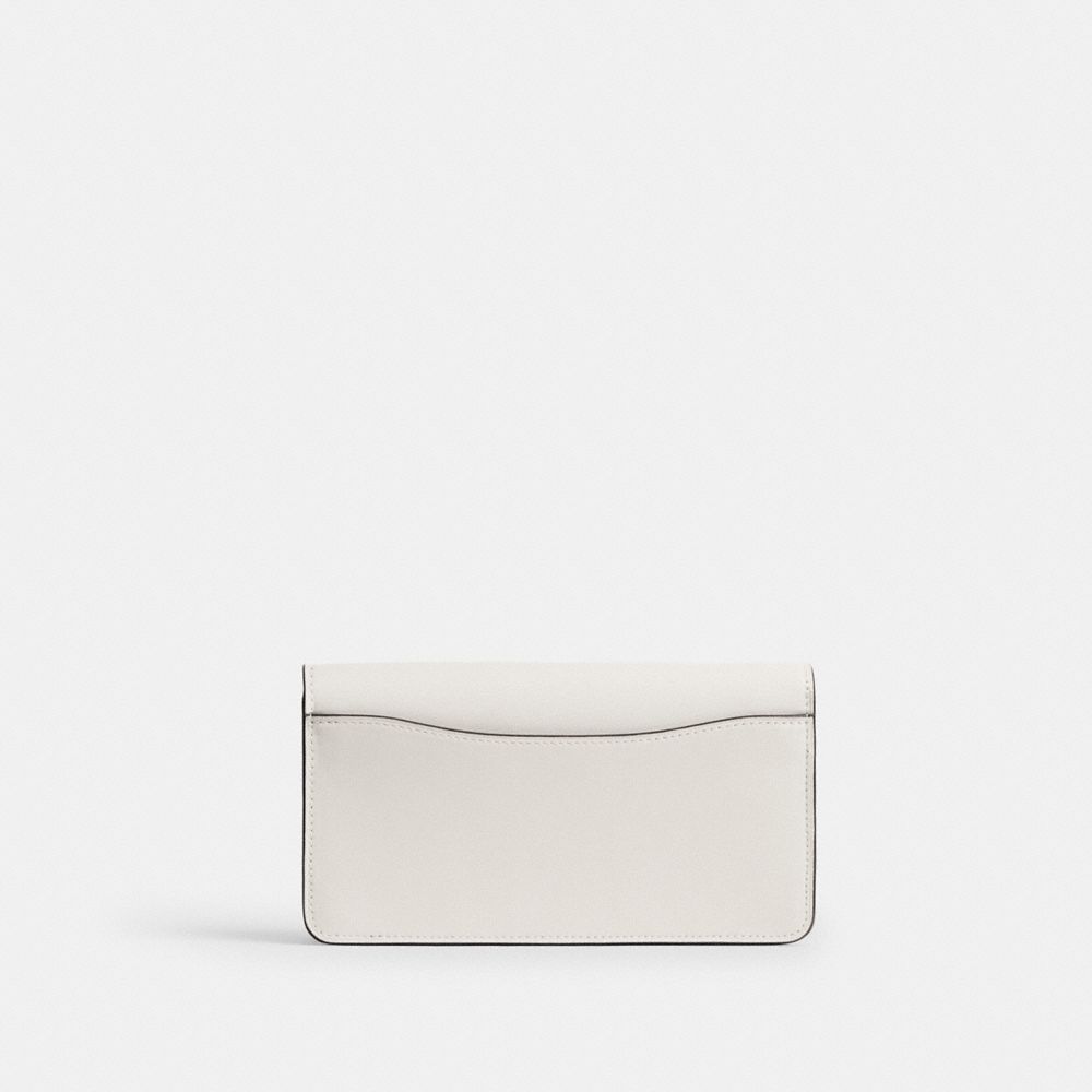 Shop Coach Tabby Clutch Aus Signature Canvas Mit Kettenriemen In Silver/white Chalk